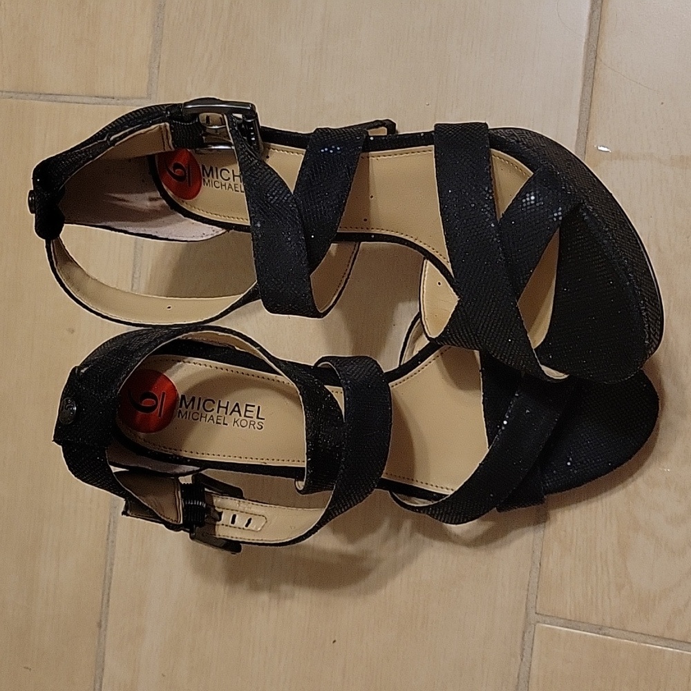 Brand new and never worn Michael Kors Black heels